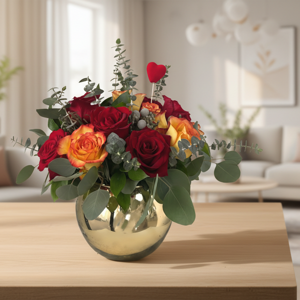 24 vibrant mixed roses and sage greenery in a gold or silver bowl.
Gladys Flowers - Miami. Romance and Valentine's
