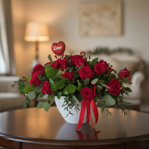 Striking arrangement of 24 roses and lush greenery. Perfect for valentine's day.