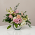 Mix of roses, spray roses, alstroemerias, hydrangeas, stocks, wax flowers, and lush foliage. For romantic occasions and Valentine's day - Gladys Flowers Miami