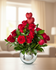 18 vibrant red roses, greenery, and a love detail, this bouquet surely make her feel loved and appreciated.