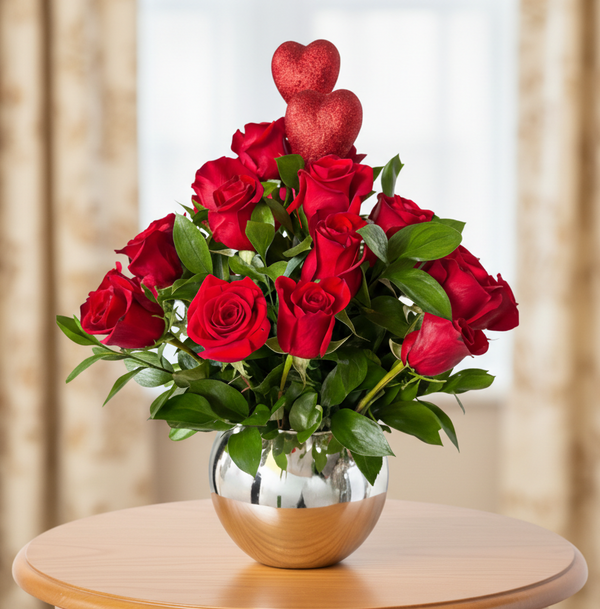 18 vibrant red roses, greenery, and a love detail, this bouquet is perfect for any love occasion. Gladys Flowers Miami