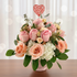 Give a charming floral arrangement that embodies the tender hues of romance with a delightful blend of 15 roses, spray roses, fluffy hydrangeas, and lush greenery.