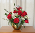12 stunning roses, spray roses, alstroemelias, and a variety of lush greenery, all perfectly arranged in a bowl. Gladys Flowers Miami - Valentine's