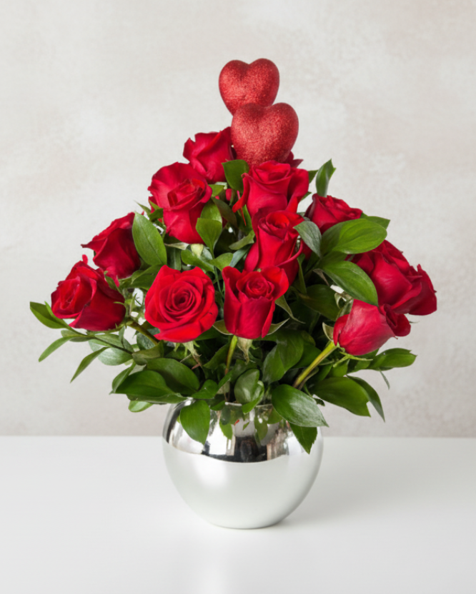 18 vibrant red roses, greenery, and a love detail, this bouquet is perfect for any love occasion. Gladys Flowers Miami